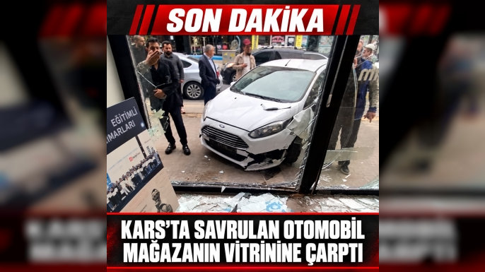 Kars’ta Savrulan Otomobil Mağazanın Vitrinine Çarptı
